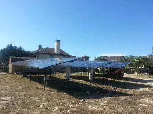 A completed ground-mount solar installation by Advanced Solar, photo 13