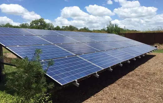 A completed ground-mount solar installation by Advanced Solar, photo 17